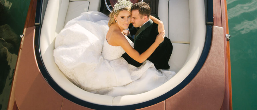 gorgeous couple portrait on luxury Riva boat at Fisher Island Club Wedding