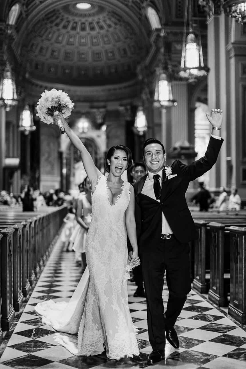 grand exit after the wedding ceremony at The Cathedral Basilica of Saints and Paul in Philadelphia